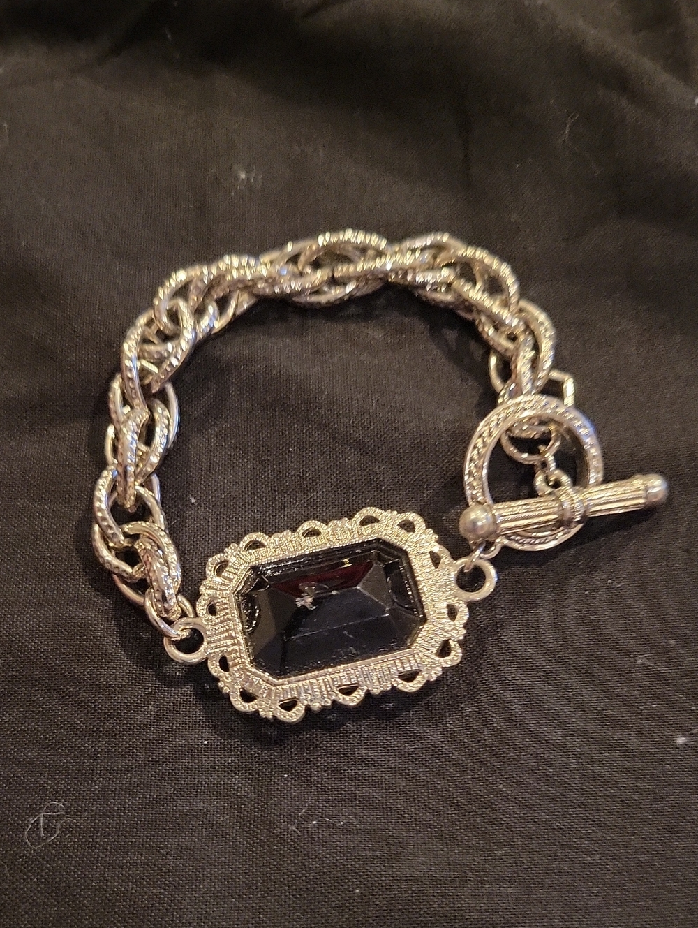 Vintage-Inspired Silver Bracelet with Black Gem Accent